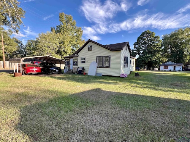 view of property exterior with a yard and a carport