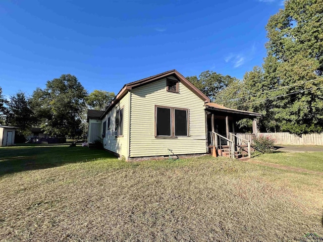 view of property exterior featuring a yard