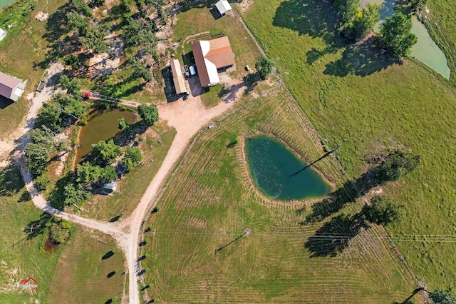 aerial view featuring a water view and a rural view