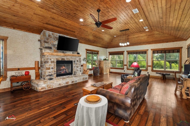 living room featuring ceiling fan, a stone fireplace, dark hardwood / wood-style floors, lofted ceiling, and wood ceiling