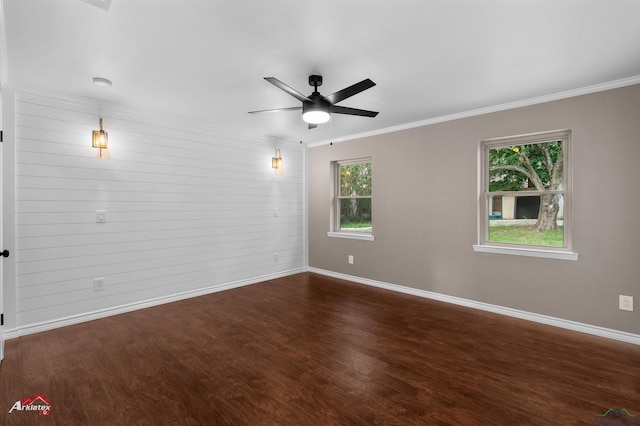 404 Pinewood, Marshall, TX 75672 - spare room featuring wood finished floors, ceiling fan, and ornamental molding