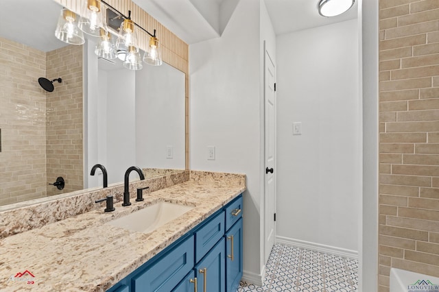404 Pinewood, Marshall, TX 75672 - bathroom featuring vanity, washtub / shower combination, and a chandelier