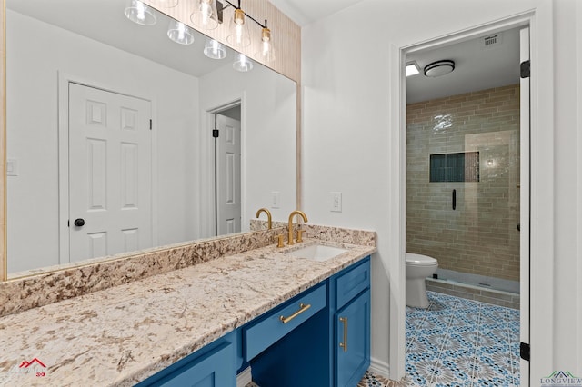 404 Pinewood, Marshall, TX 75672 - bathroom featuring vanity, a stall shower, and tile patterned flooring