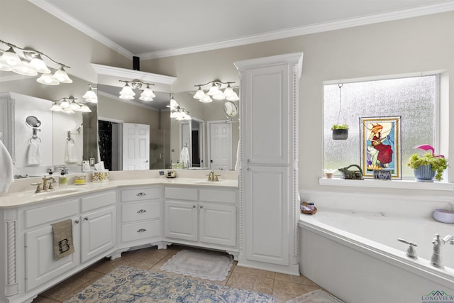 bathroom with tile patterned flooring, vanity, a bathtub, and ornamental molding