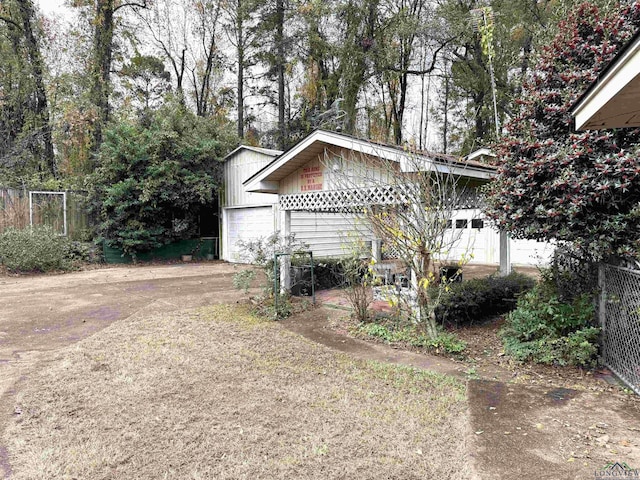 view of home's exterior with a garage