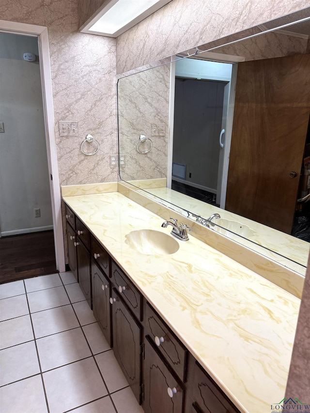 bathroom with vanity and tile patterned floors