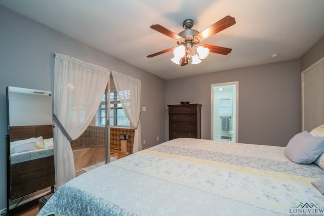 bedroom with connected bathroom and ceiling fan