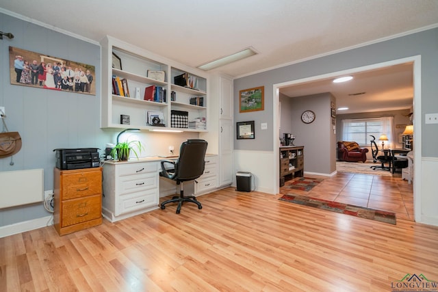 office space featuring light hardwood / wood-style flooring and ornamental molding