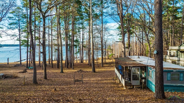 view of yard with a water view