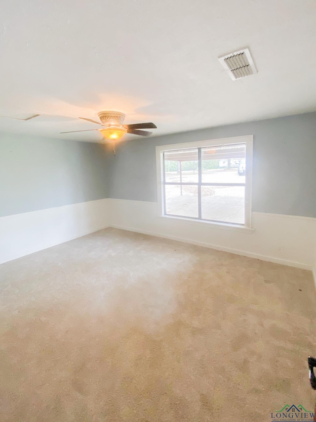 spare room featuring carpet flooring