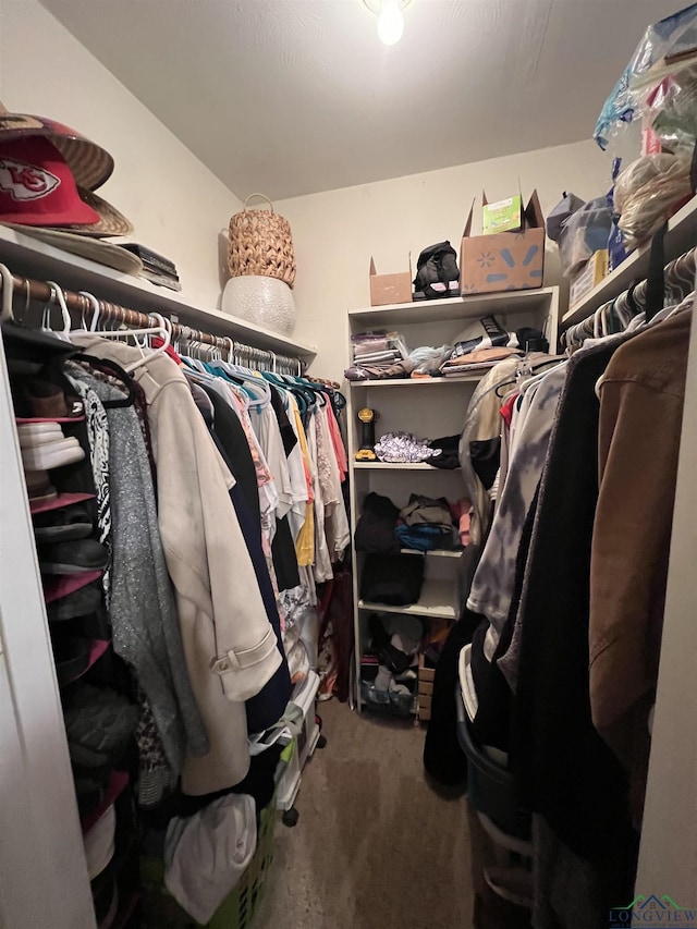 406 Campbell St, Daingerfield, TX 75638 - walk in closet featuring carpet