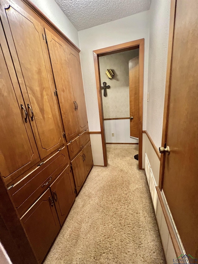 406 Campbell St, Daingerfield, TX 75638 - hall with light carpet and a textured ceiling