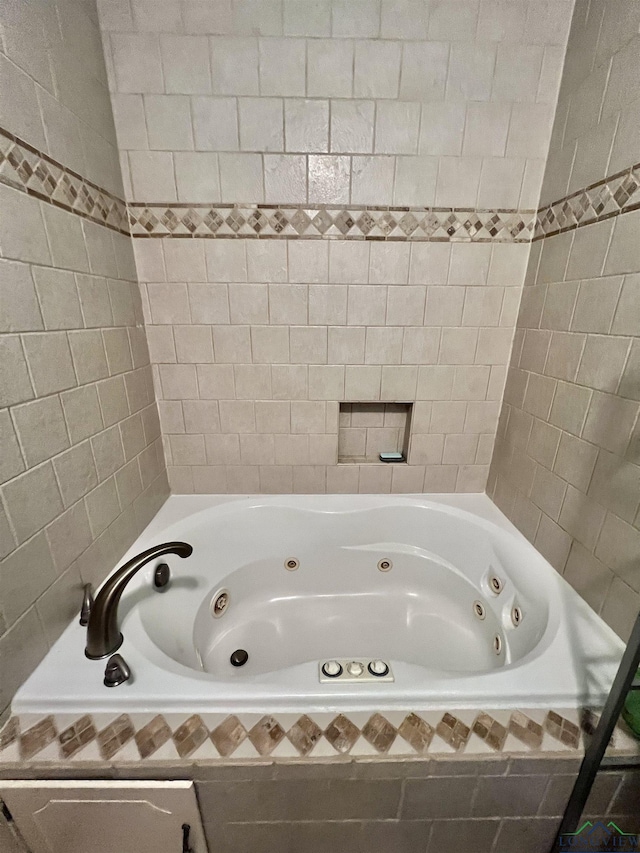 406 Campbell St, Daingerfield, TX 75638 - bathroom with a whirlpool tub
