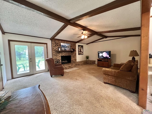 406 Campbell St, Daingerfield, TX 75638 - living room with carpet floors, a textured ceiling, a ceiling fan, french doors, and a fireplace