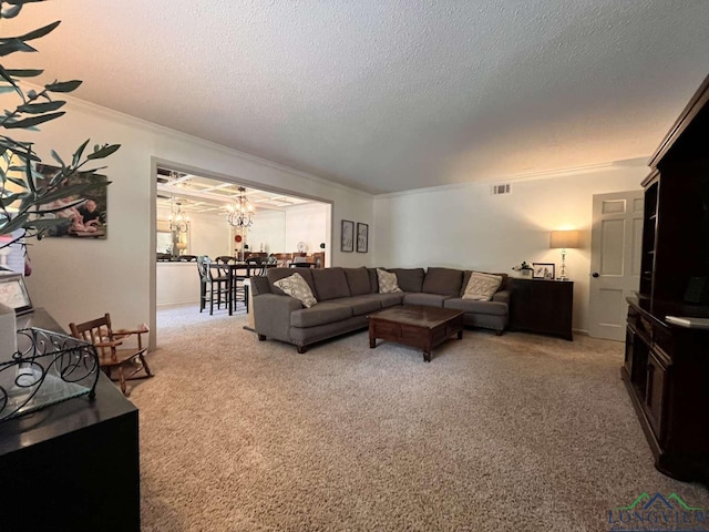 16 Pegues Pl, Longview, TX 75601 - living area featuring crown molding, a textured ceiling, light carpet, and a chandelier