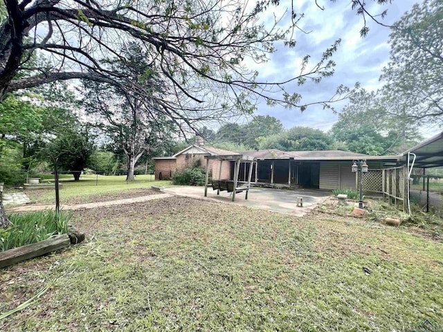 view of yard with a patio area