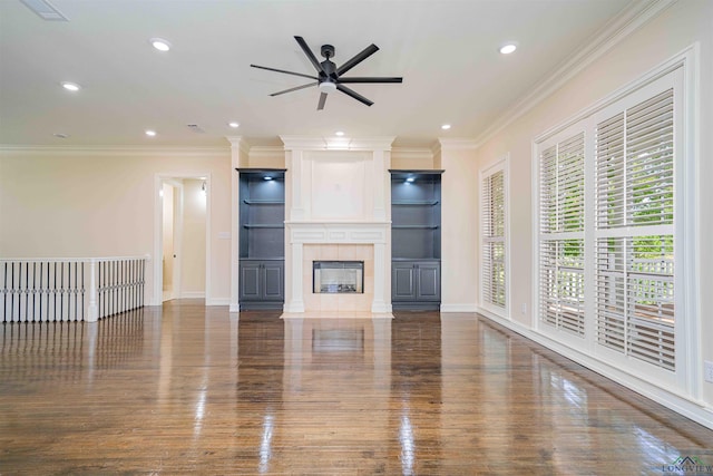unfurnished living room featuring ornamental molding, wood finished floors, baseboards, recessed lighting, and a ceiling fan