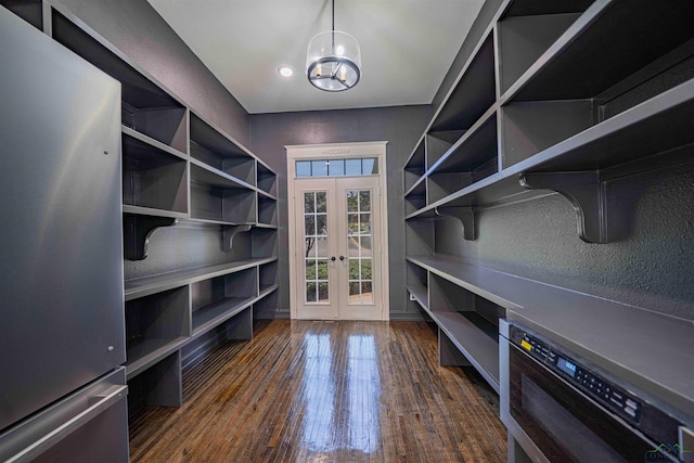 interior space with french doors and dark wood-type flooring