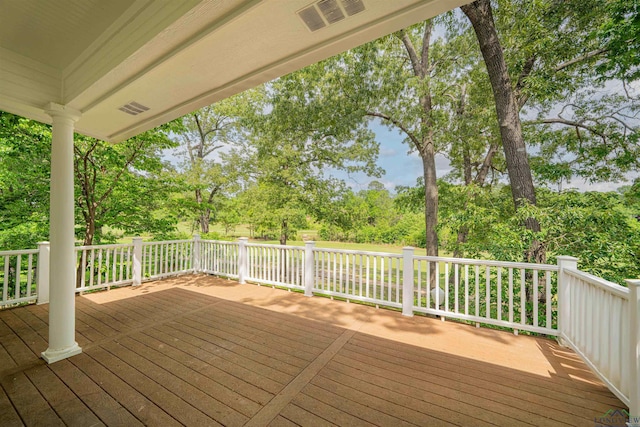wooden deck with visible vents