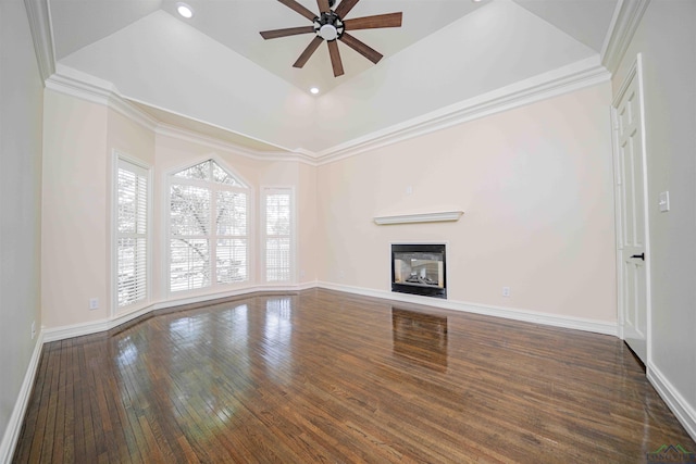 unfurnished living room with baseboards, a glass covered fireplace, ceiling fan, and hardwood / wood-style floors