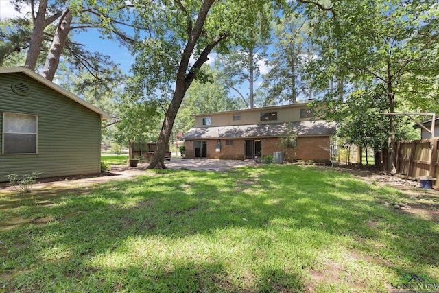 1800 Shady Ln, Longview, TX 75604 - view of yard featuring a patio and cooling unit