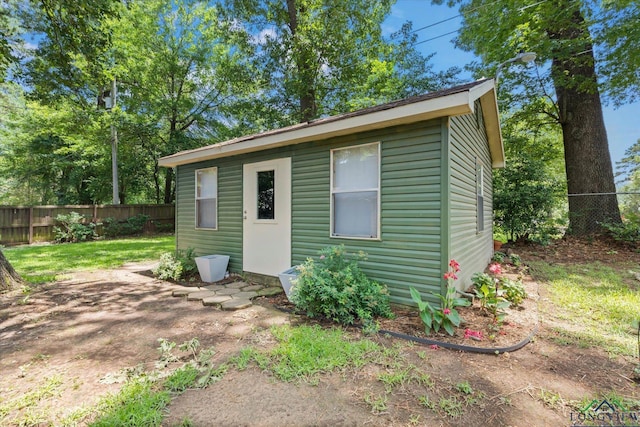 1800 Shady Ln, Longview, TX 75604 - view of outbuilding with a fenced backyard