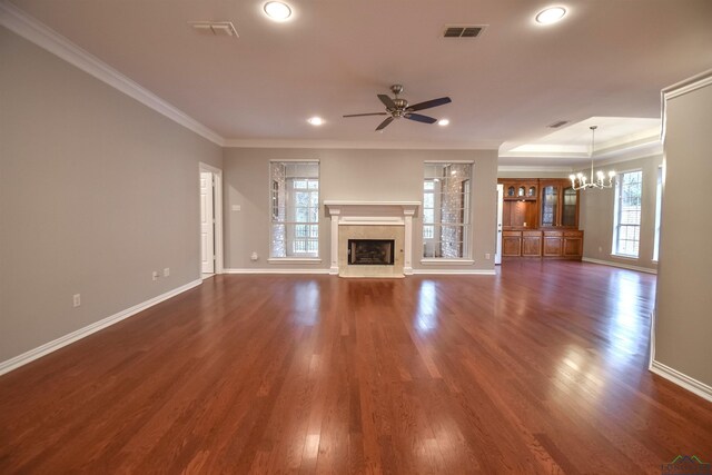 5816 Hollybrook Dr, Tyler, TX 75703 - unfurnished living room with a fireplace, a ceiling fan, a chandelier, crown molding, and baseboards