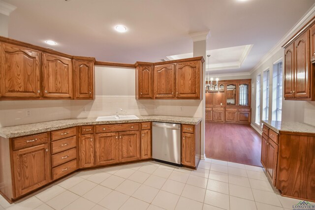 5816 Hollybrook Dr, Tyler, TX 75703 - kitchen with stainless steel dishwasher, ornamental molding, a sink, brown cabinets, and recessed lighting