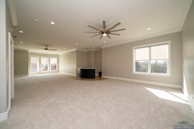 unfurnished living room with ceiling fan, light carpet, and ornamental molding