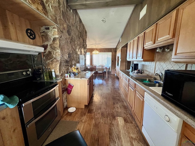 kitchen with dishwasher, pendant lighting, double oven range, decorative backsplash, and sink