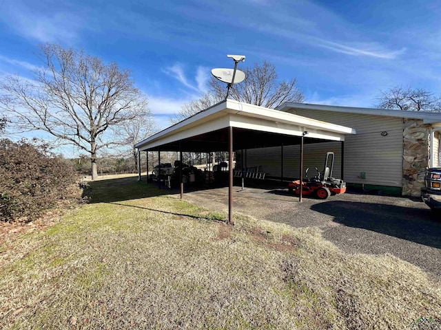 view of parking / parking lot with a carport