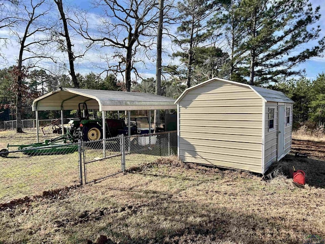 view of outbuilding featuring a lawn and a carport