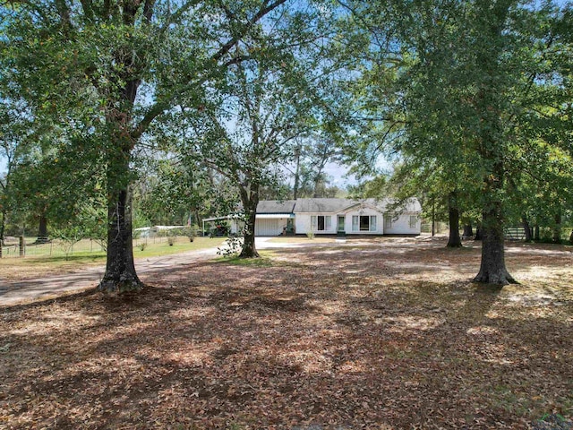 view of yard featuring a garage