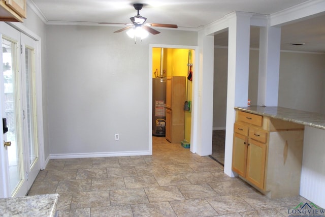 kitchen featuring gas water heater, ceiling fan, and crown molding