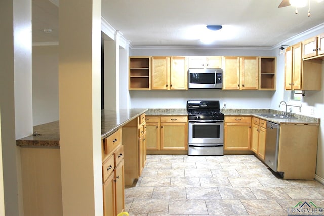 kitchen featuring appliances with stainless steel finishes, light brown cabinets, crown molding, and sink