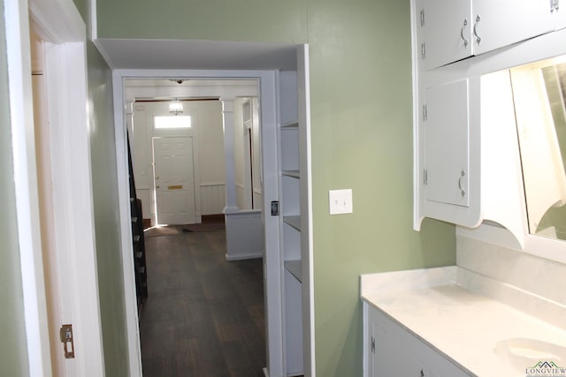 bathroom featuring hardwood / wood-style floors and vanity