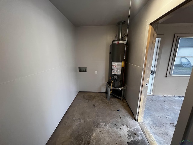 utility room featuring gas water heater