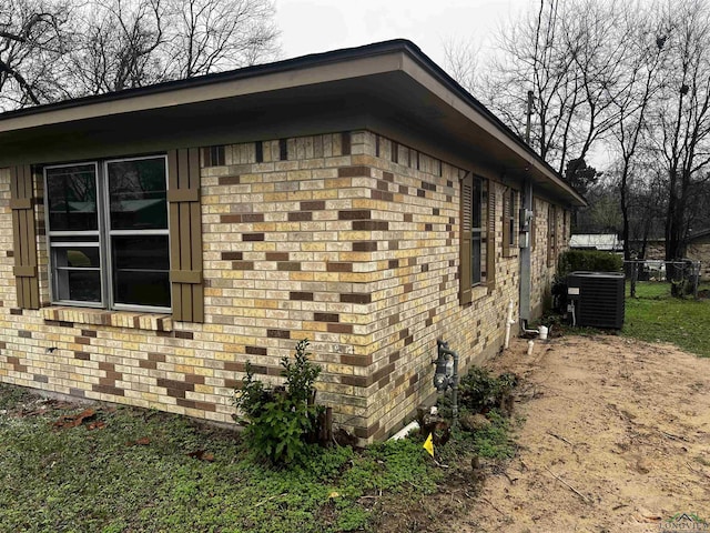 view of property exterior featuring central air condition unit