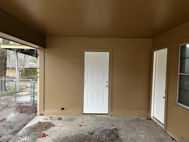 doorway to property with a patio area