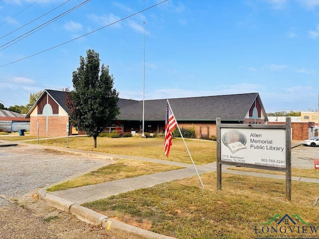 exterior space featuring a front lawn