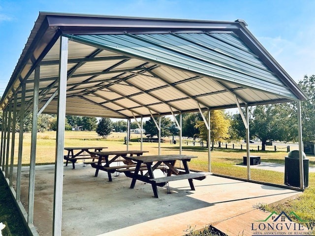 view of property's community featuring a gazebo and a lawn