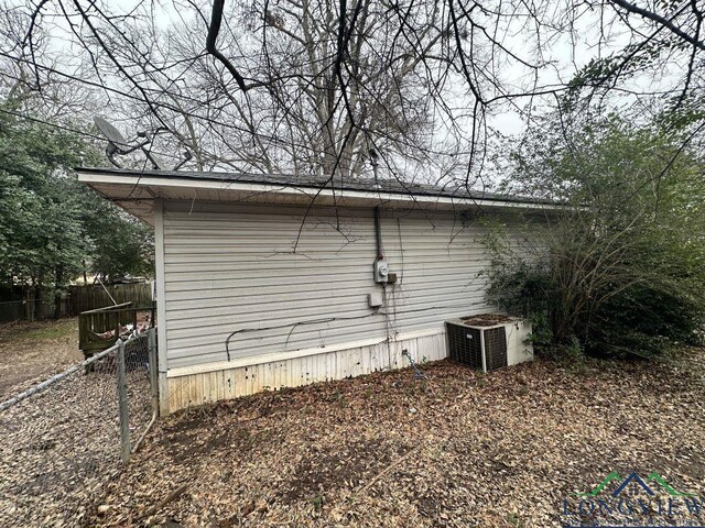 view of property exterior featuring central air condition unit