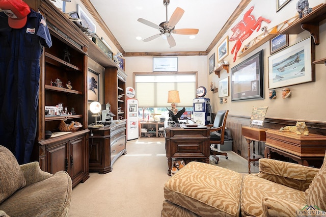 office featuring crown molding, light colored carpet, and ceiling fan