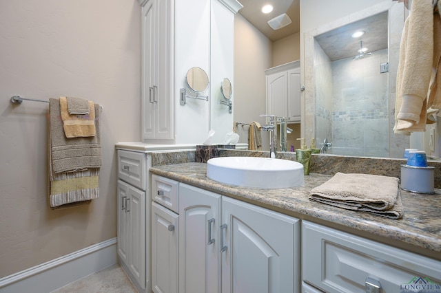 bathroom with vanity and an enclosed shower