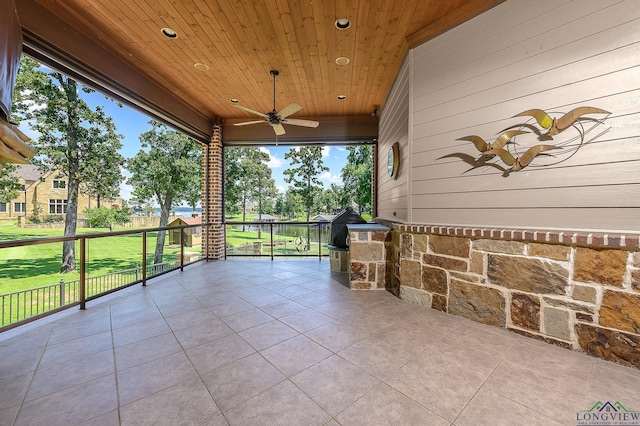 view of patio with ceiling fan