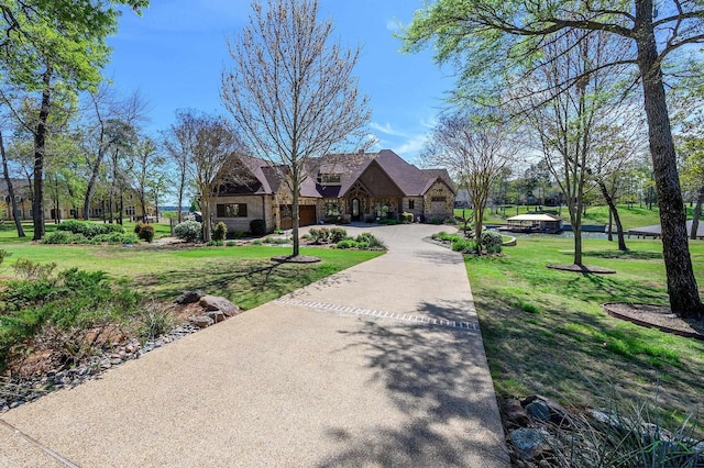 view of front of home with a front lawn