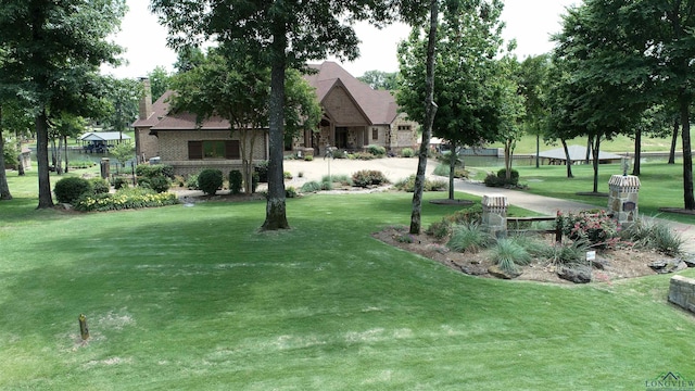 view of community with a lawn