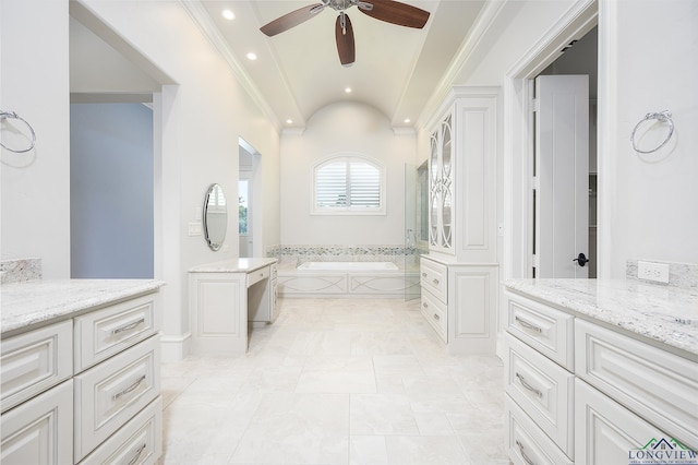 bathroom featuring vanity, ornamental molding, tiled bath, and ceiling fan