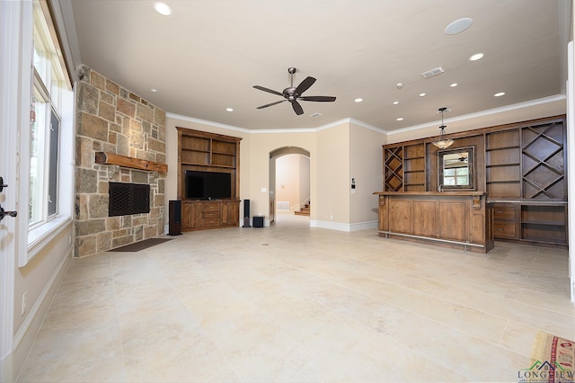 living room featuring crown molding and ceiling fan