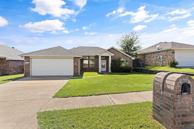 ranch-style home featuring a front yard and a garage